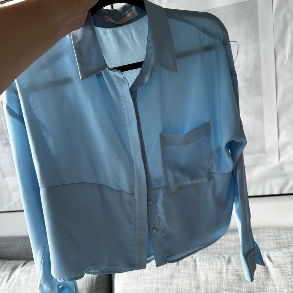 Light blue shirt from iso Greece. Perfect condition used only 4-5 times.